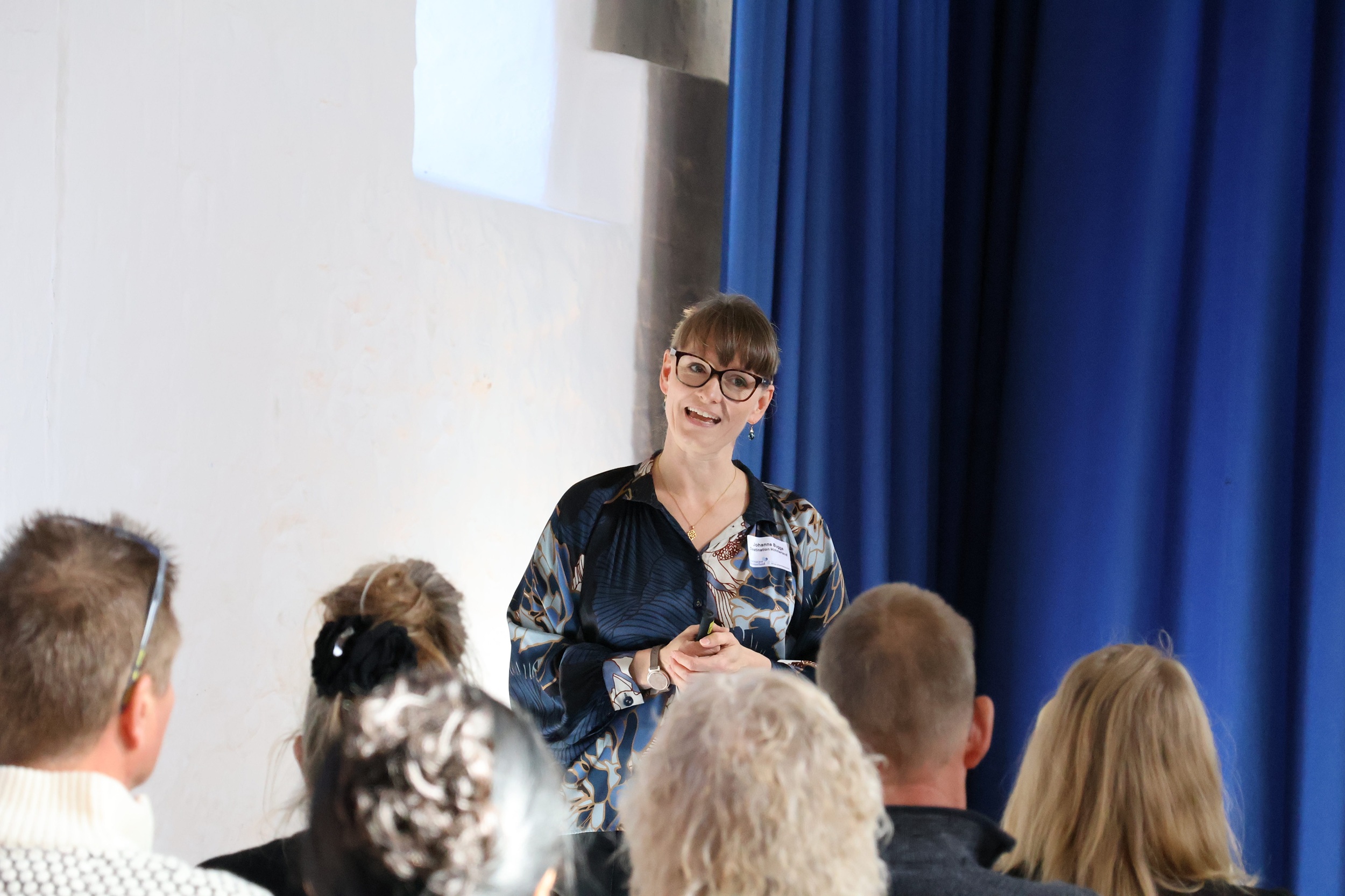 Johanne Bugge byder velkommen til årets Partnerskabsdag 2025